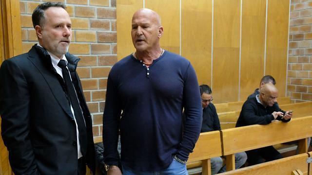 Rafi Refaeli in court with his lawyer