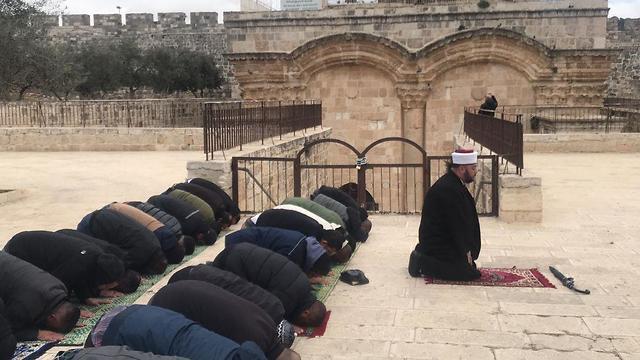 Muslim Prayers next to the shuttered compound on Temple Mount