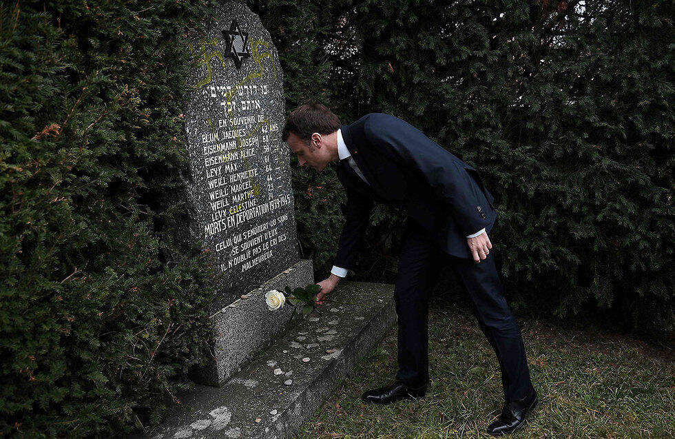 Emanuel Macron at a vandalized Jewish cemetery (Photo: AFP) (צילום: AFP) Emanuel Macron at a vandalized Jewish cemetery (Photo: AFP)