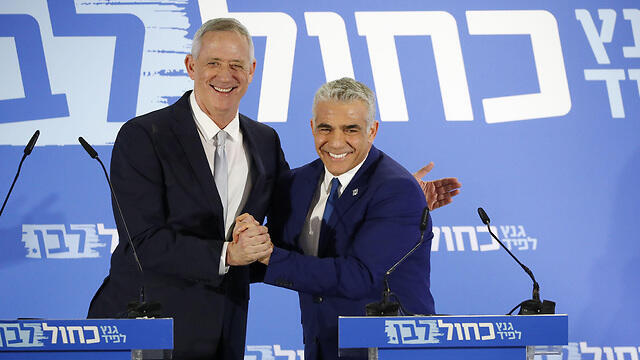 Ганц и Лапид. Фото: AFP