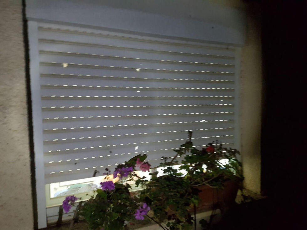 Окно, поврежденное взрывом