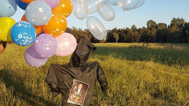 Связка шаров с портретом террориста из Газы в Эшколе