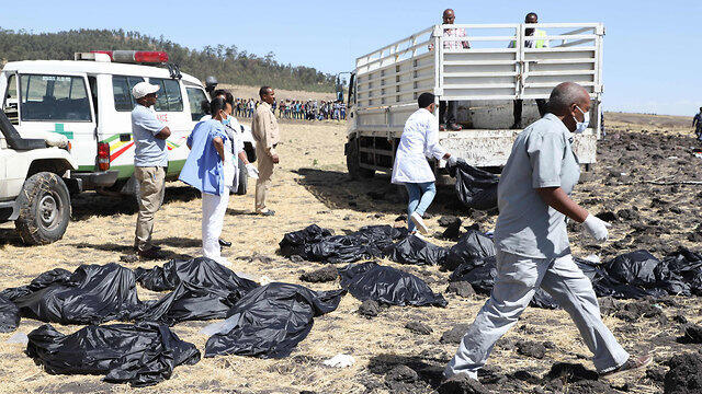 Rescue teams at the crash site on Sunday