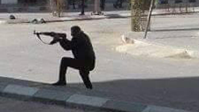 Hamas operative shoots at protesters