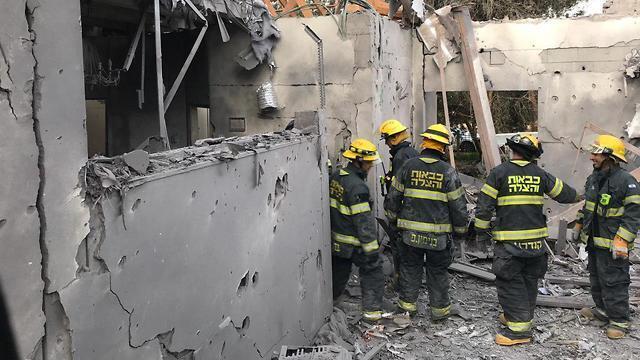Разрушенный ракетой дом. Фото: Коби Тамам, Служба пожарной охраны