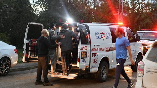 Evacuating the wounded after the rocket strike