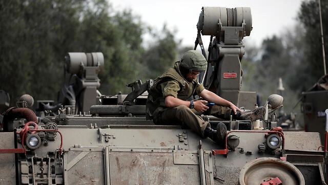 IDF troops making their way to Gaza border