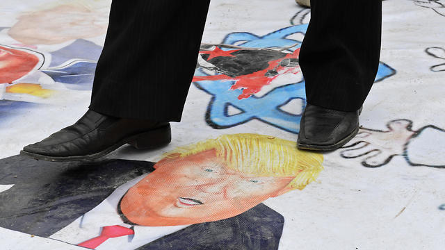 Syrians protest in the northern city of Aleppo against the US' decision to recognise Israel's sovereignty over the Golan Heights (Photo: AFP) Syrians protest in the northern city of Aleppo against the US' decision to recognise Israel's sovereignty over the Golan Heights