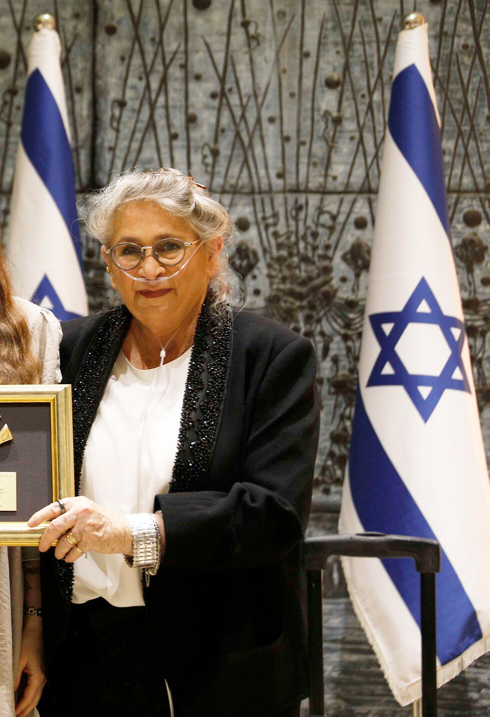 Нехама Ривлин в строгом черном костюме. Фото: Алекс Коломойский