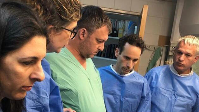 Abu Kabir forensic scientists who identified Baumel's remainsnullnull Abu Kabir forensic scientists who identified Baumel's remains