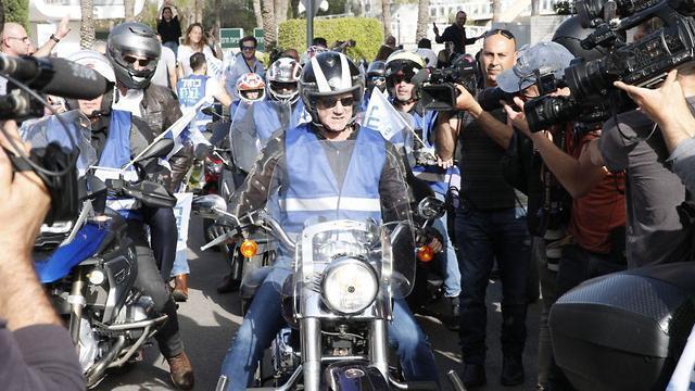 Benny Gantz leading 100 bikers in a campaign parade one day ahead of elections