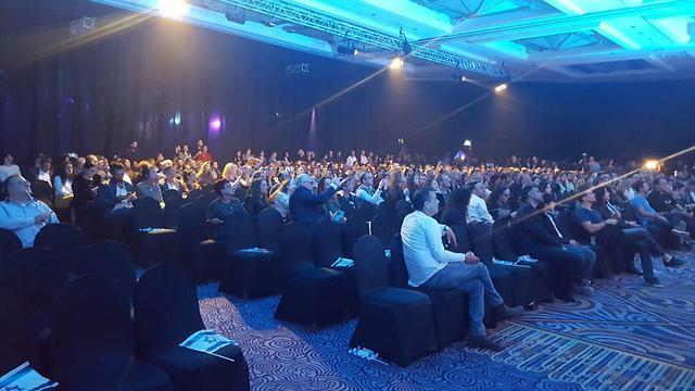 The audience that came to watch the landing at a Tel Aviv hotel