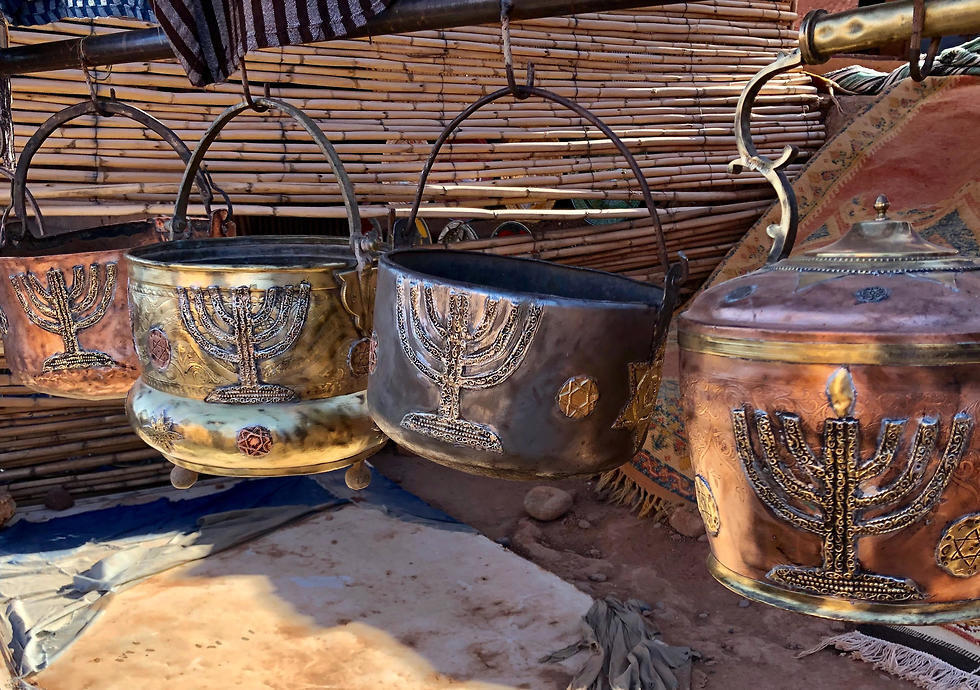 Cooking pots adorned with menorahs at an outdoor stall in Ksar of Ait-Ben-Haddou in southern Morocco (Photo: AP) Cooking pots adorned with menorahs at an outdoor stall in Ksar of Ait-Ben-Haddou in southern Morocco