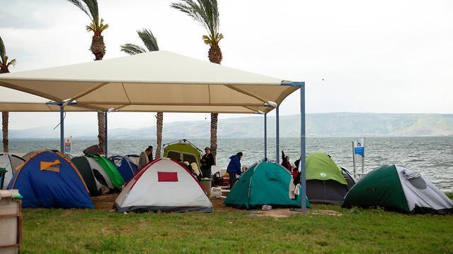 Tourists camping at the Sea of Galilee