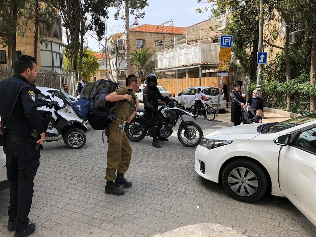 Нападение на солдата ЦАХАЛа в Меа-Шеарим. Фото: Лиран Тамри (Фото: Лиран Тамри) Нападение на солдата ЦАХАЛа в Меа-Шеарим. Фото: Лиран Тамри
