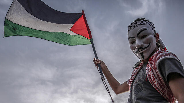 Палестинский террорист. Фото: ЕРА (צילום: EPA) Палестинский террорист. Фото: ЕРА