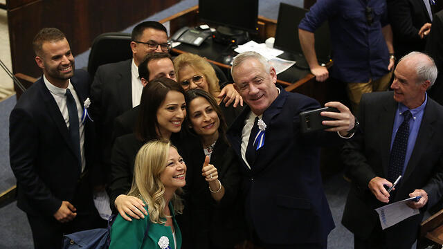 Benny Gantz and other MKs take a selfie during the Knesset's opening ceremony (צילום: עמית שאבי) Benny Gantz and other MKs take a selfie during the Knesset's opening ceremony