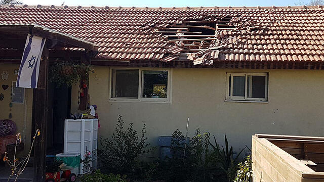 A home on Kibbutz Nahal Oz is hit by rocket fire