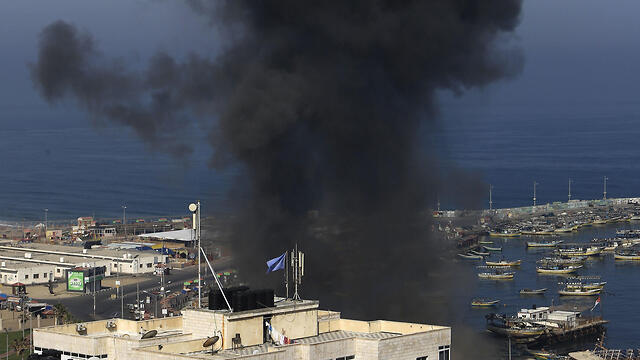 Smoke rises over a Gaza marine facility following IDF strikes