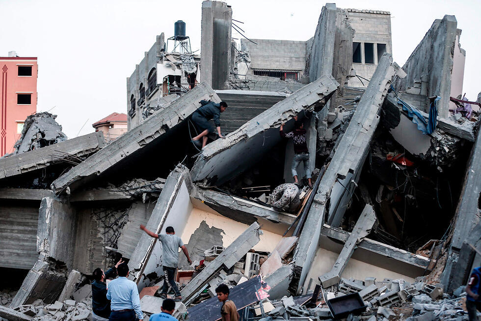 Damage in Gaza from an IAF strike (צילום: AFP) Damage in Gaza from an IAF strike