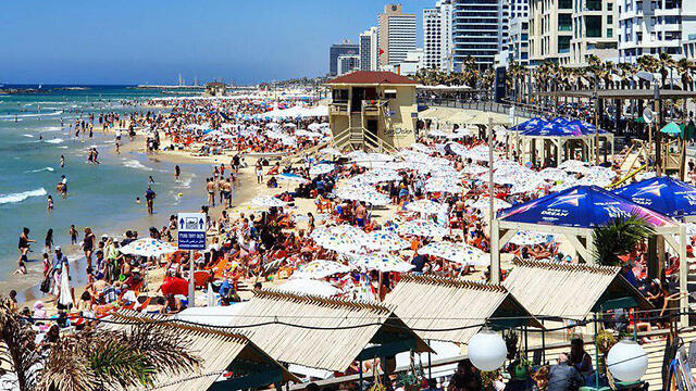 Tel Aviv beach is decorated with the Eurovision  logo