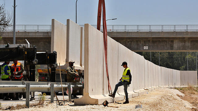 Concerete barriers are placed in Sderot to counter rocket fire from Gaza (Photo: AFP)