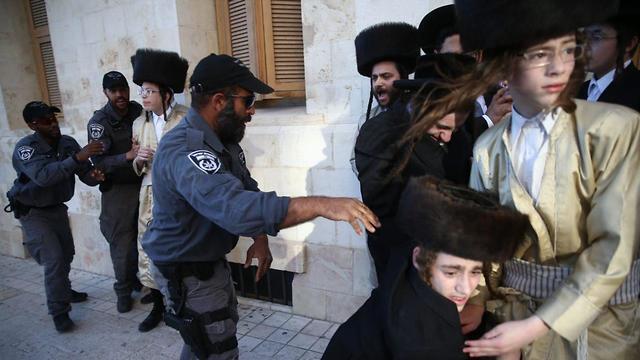 Hareedi men protest over the staging of the Eurovision Song Contest in Tel Aviv during Shabbat