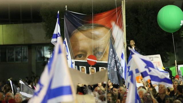 Banners with Erdogan held during the protest