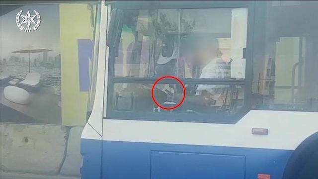 A bus driver for the Dan company in central Israel caught texting while driving (צילום: דוברות המשטרה ) A bus driver for the Dan company in central Israel caught texting while driving