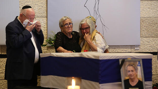 President Reuven Rivlin mourns his wife as her coffin lies in state in Jerusalem Theater