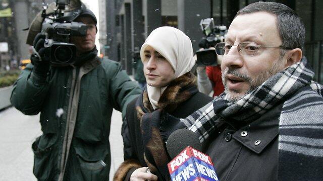 Abdelhaleem Ashqar and his wife leave federal court in Chicago in 2007