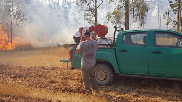 Тушение пожара в лесу Беэри. Фото: Моше Брухи, ККЛ