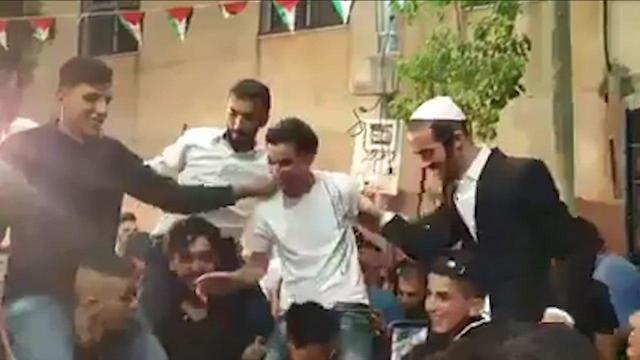 Israeli settlers participating in Palestinian wedding 