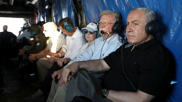 Benjamin Netanyahu and John Bolton on an aerial tour of the Jordan Valley (צילום: רויטרס) Benjamin Netanyahu and John Bolton on an aerial tour of the Jordan Valley