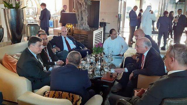 Yoav Mordechai (left) , an Israeli businessman and former coordinator of Israeli activities in the Palestinian Territories, in Bahrain on June 25, 2019