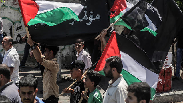Palestinians protest against the Bahrain summit, June 25, 2019
