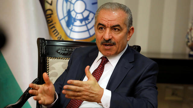 Palestinian Prime Minister Mohammad Shtayyeh at his office in Ramallah, June 27, 2019 (Photo: Reuters) Palestinian Prime Minister Mohammad Shtayyeh at his office in Ramallah, June 27, 2019
