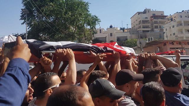 The funeral for Muhammad Abeid, who was killed by police in June 