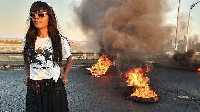 Участница протеста. Фото: Илана Куриэль