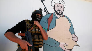 נג'ף עיראק עיראק אל-חשד א-שעבי PMF מיליציות שיעיות הגיוס העממי