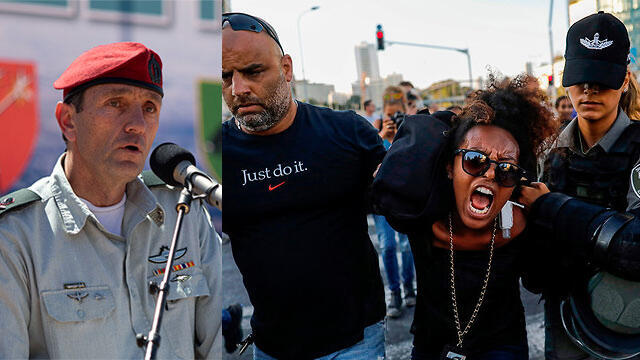 Герци Халеви, протест эфиопской общины. Фото: AP, Ярив Кац (צילום: יריב כץ, AFP) Герци Халеви, протест эфиопской общины. Фото: AP, Ярив Кац