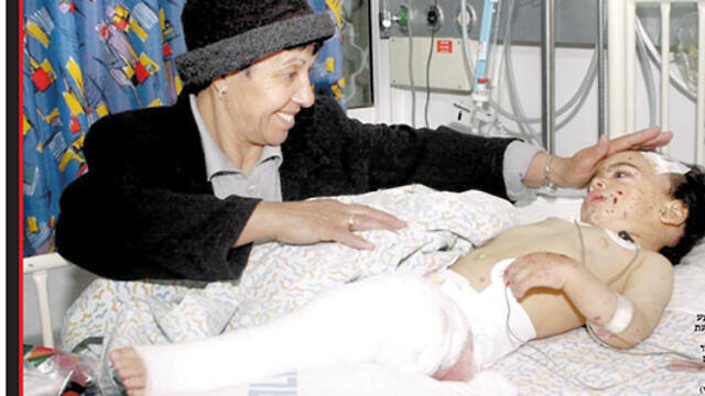S. in the hospital after his injury in 2002