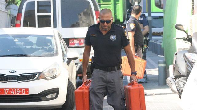 Криминалист на месте преступления. Фото: Моти Кимхи