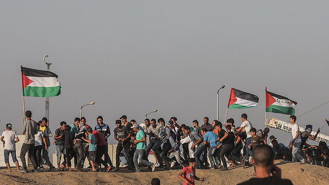 Palestinian protests at the Israel-Gaza border fence