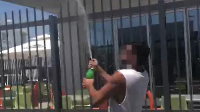 A relative of one of the former rape suspects celebrates their release in Ayia Napa