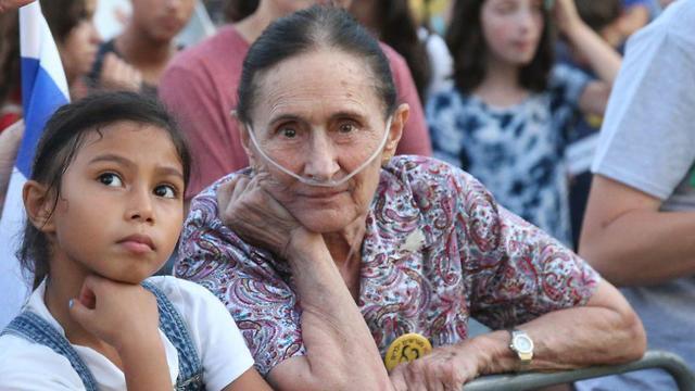 На митинге протеста против депортации нелегалов в Тель-Авиве. Фото: Моти Кимхи