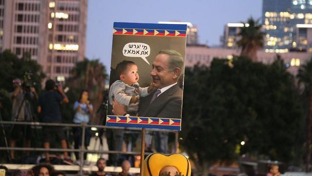 На митинге протеста против депортации нелегалов в Тель-Авиве. Фото: Моти Кимхи