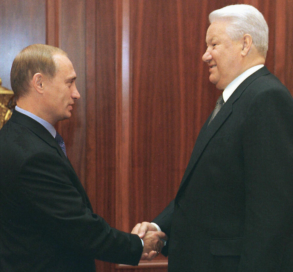 Putin and Boris Yeltsin 