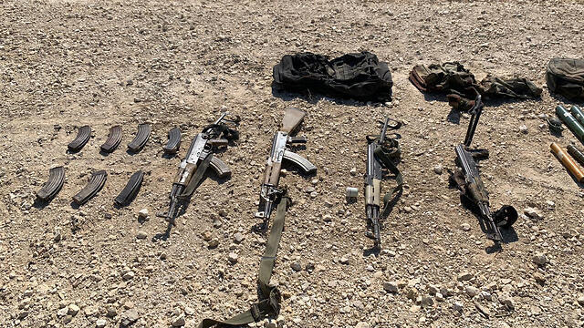 The Kalashnikov rifles carried by the four Gazans