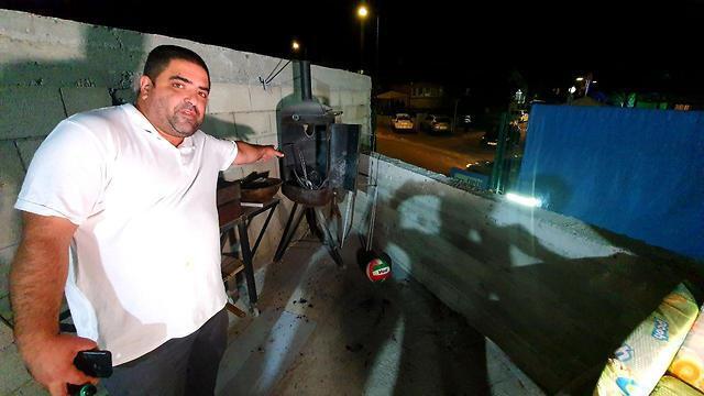 Owner of the meat smoker damaged by the shrapnel